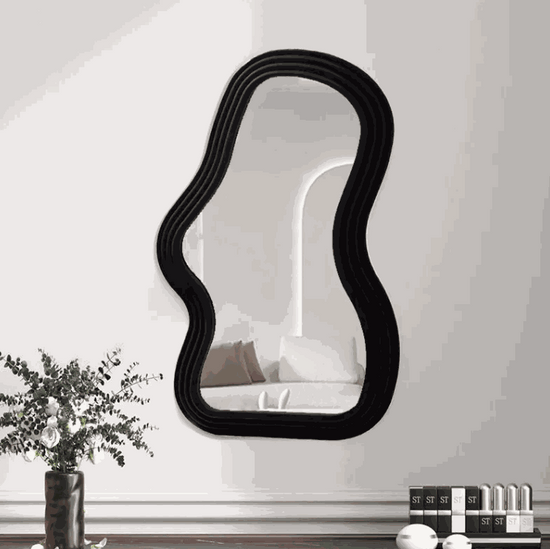 Cloud shaped makeup mirror with ripple and wave patterns in white, pink, and black colors.
