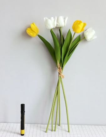 Artificial tulip room decoration in a vase with vibrant, lifelike flowers