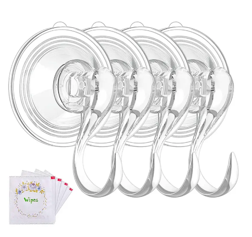 Large clear heavy-duty suction hook securely holding a wreath on a glass window