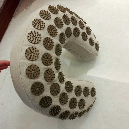 Organic linen U-shaped acupuncture neck pillow with massage heads and gold buckle design